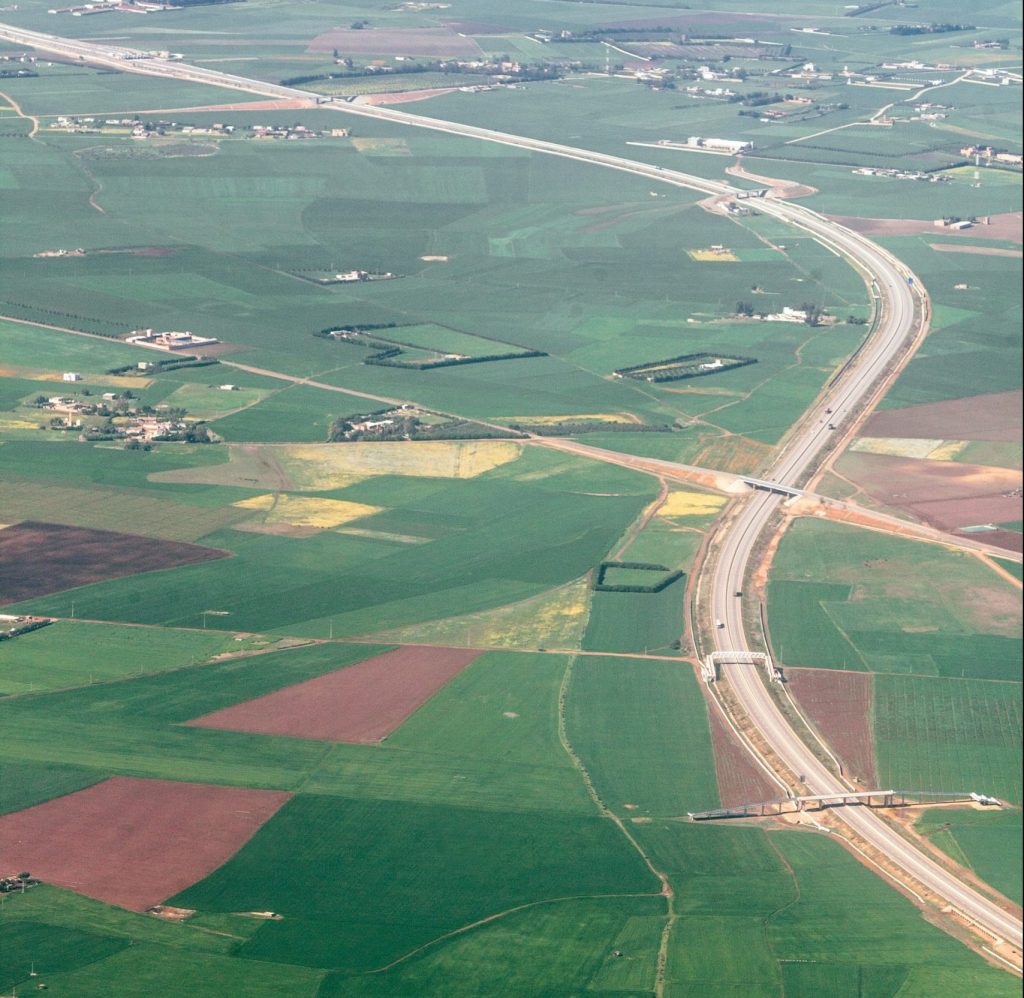 A winding bell curve-like) path photographed from above