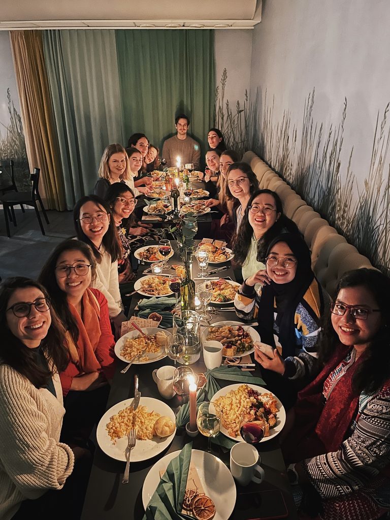 Photo of people around a dinner table