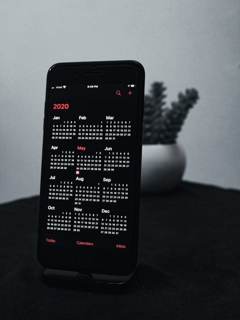 A phone screen showing the months of 2020