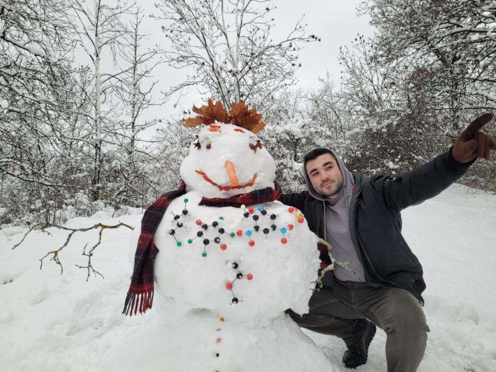Vlad Popescu building a snowman