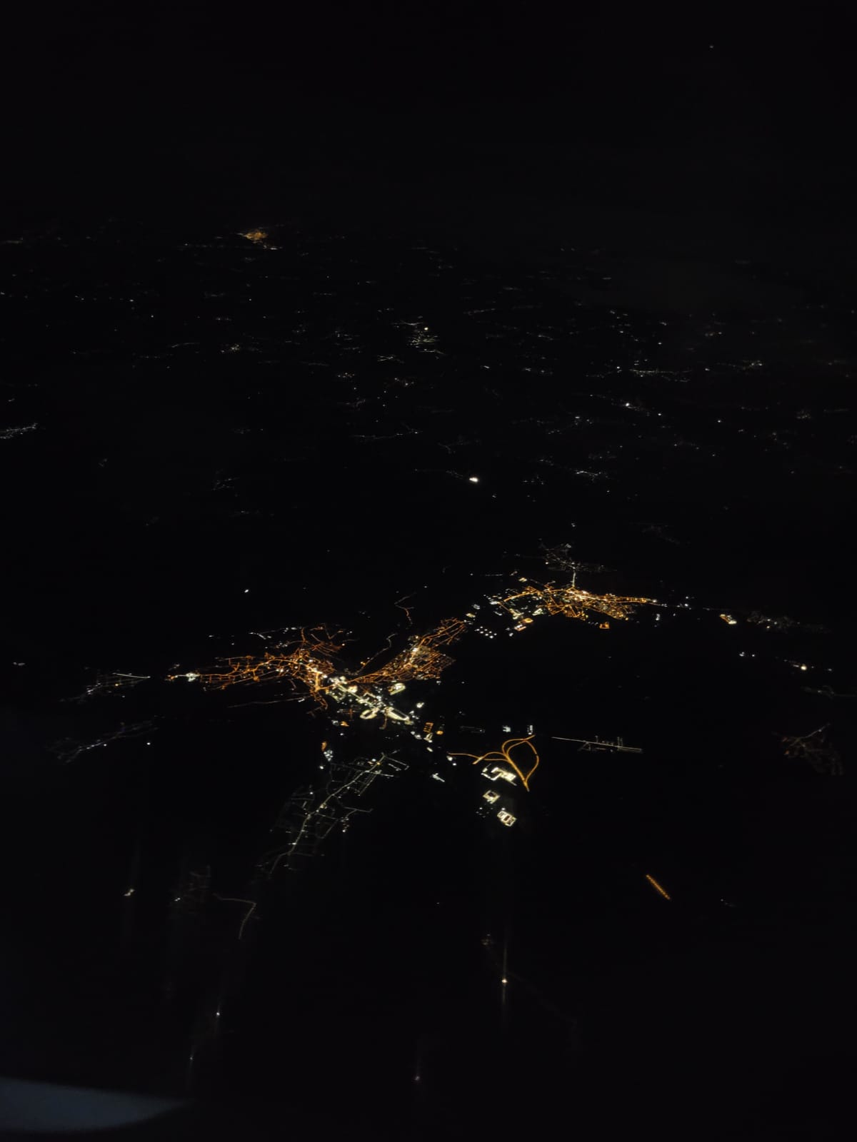 City lights seen from the airplane; Credits: Vlad Popescu