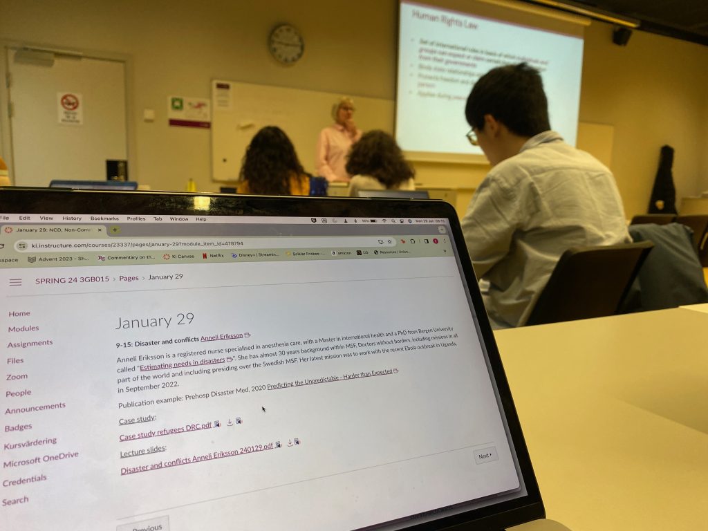 Photo of a laptop screen with 'January 29' on it, during a lecture