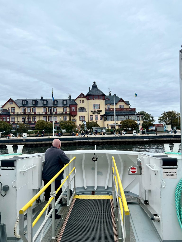 Vaxholm last summer days a view from the boat to the dock.