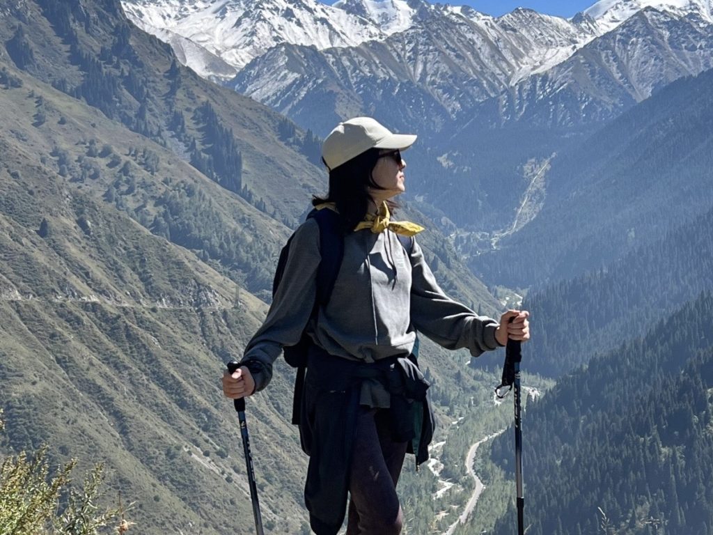 Aidana looking at her bright future in the mountains near Almaty.