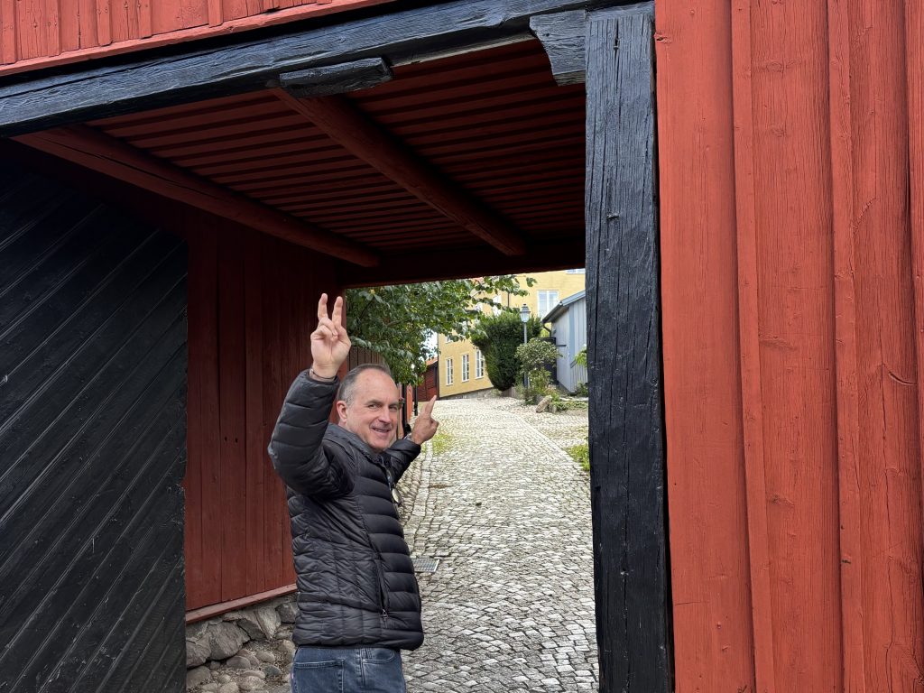 My dad exploring the tiny streets of Västerås.