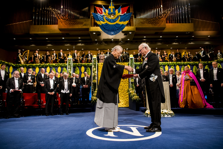 Nobel Medicine Laureate Tasuku Honjo receiving his award from HM King Carl XVI Gustaf of Sweden