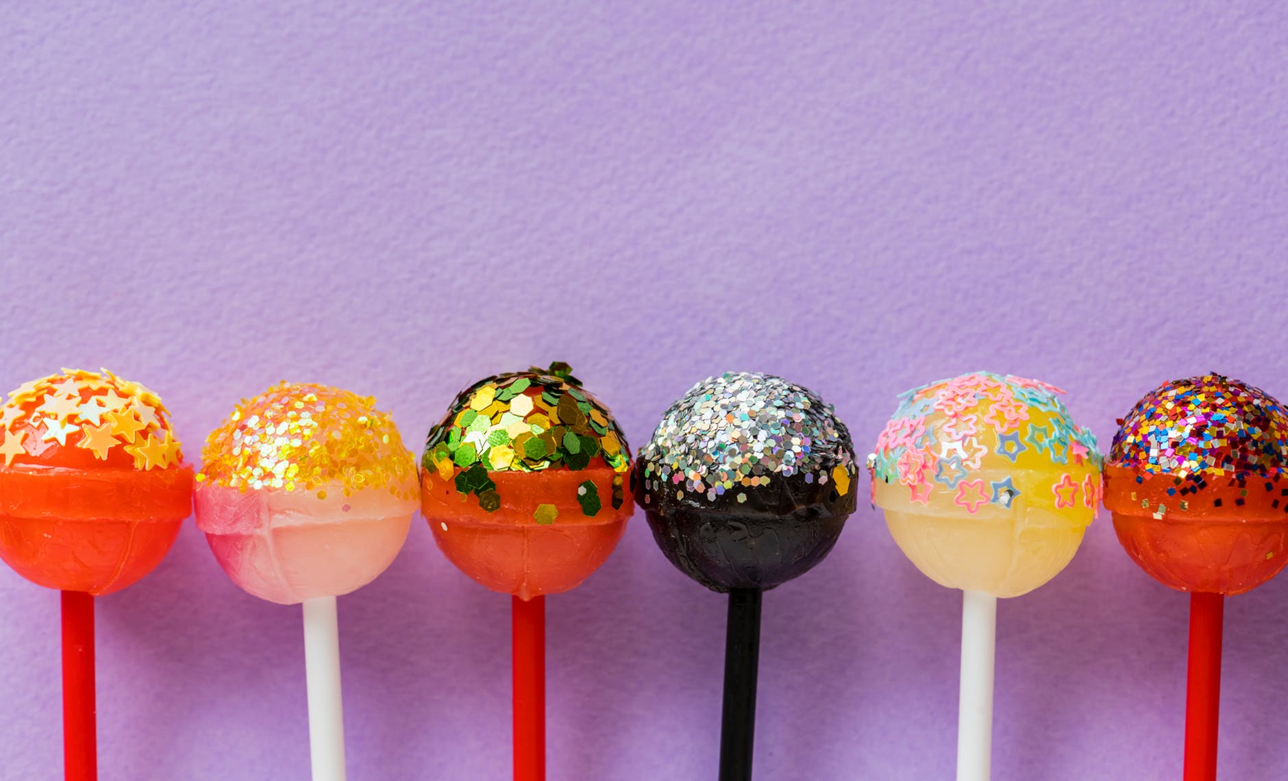 six assorted color lollipops