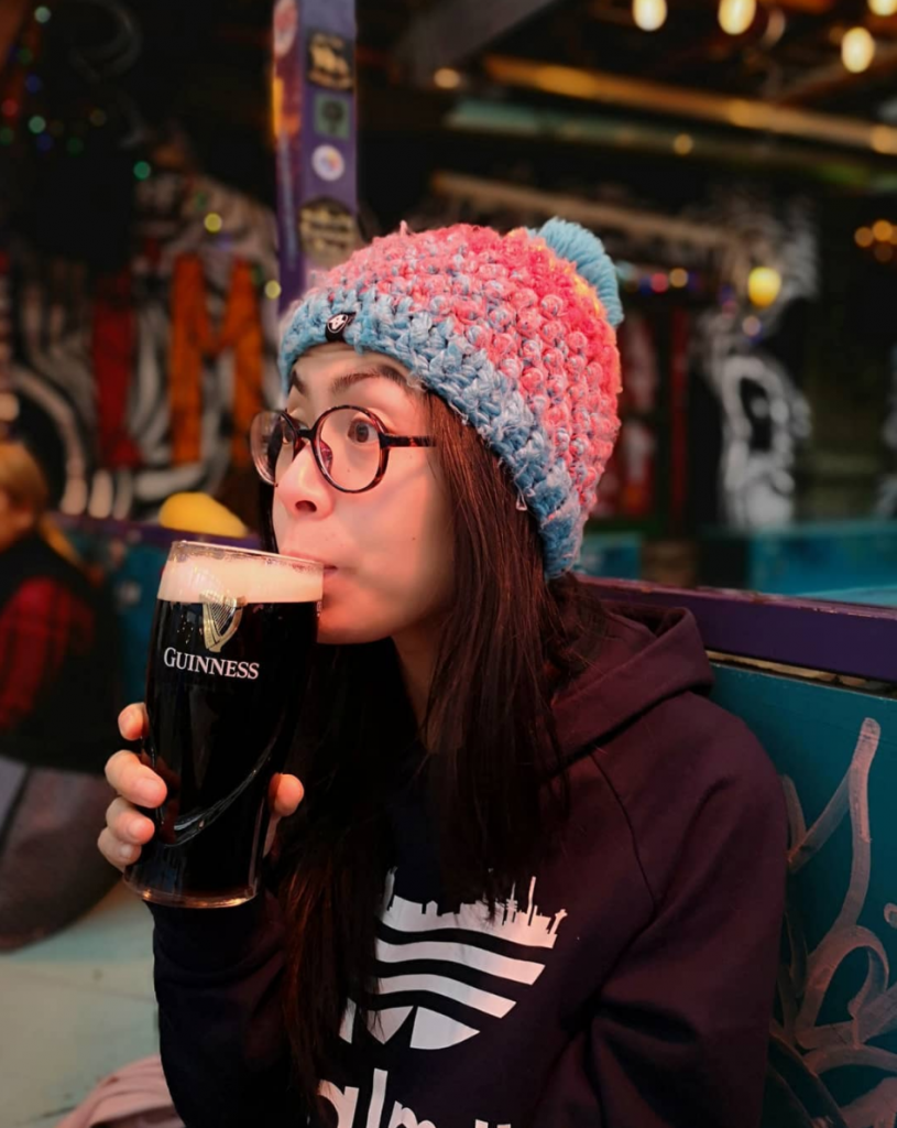 Helen sipping a Guiness