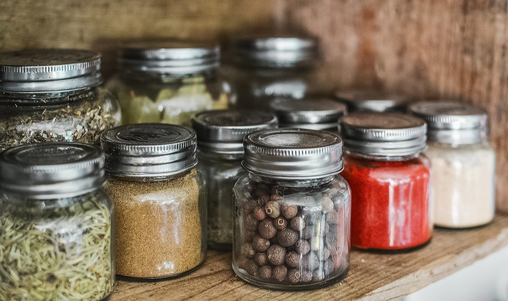 A row of spice bottles.