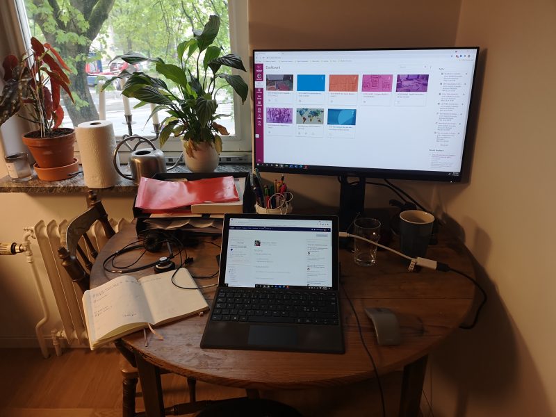 Study desk with laptop and computer monitor