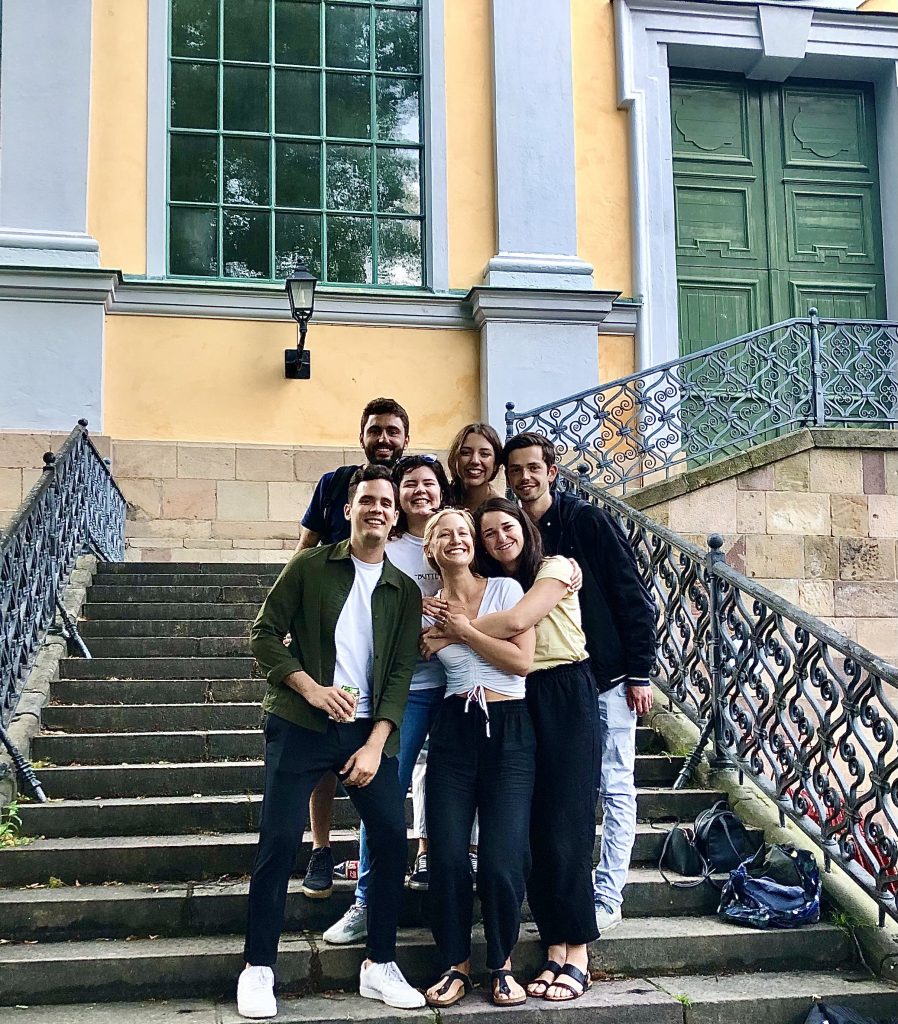 Friend group in front of a church in Sodermalm 