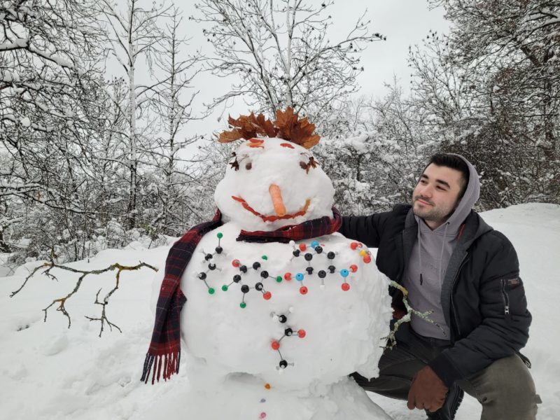Vlad Popescu building a snowman