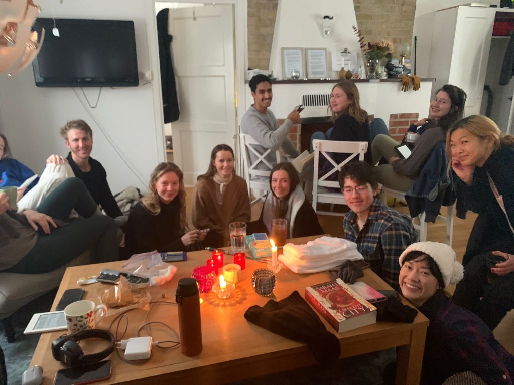 GH students lounging in the cabin's living room