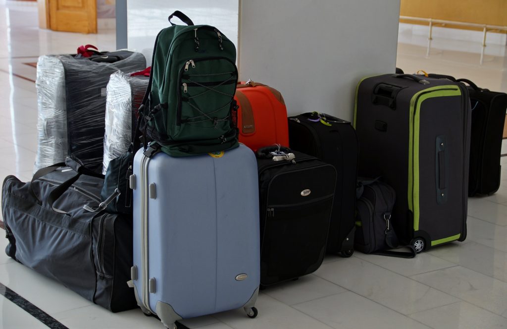 Pile of luggage. Photo by form PxHere.