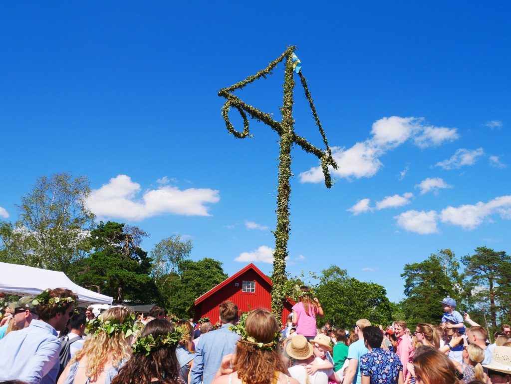Midsommar celebrations around the maypole. Events in Sweden.