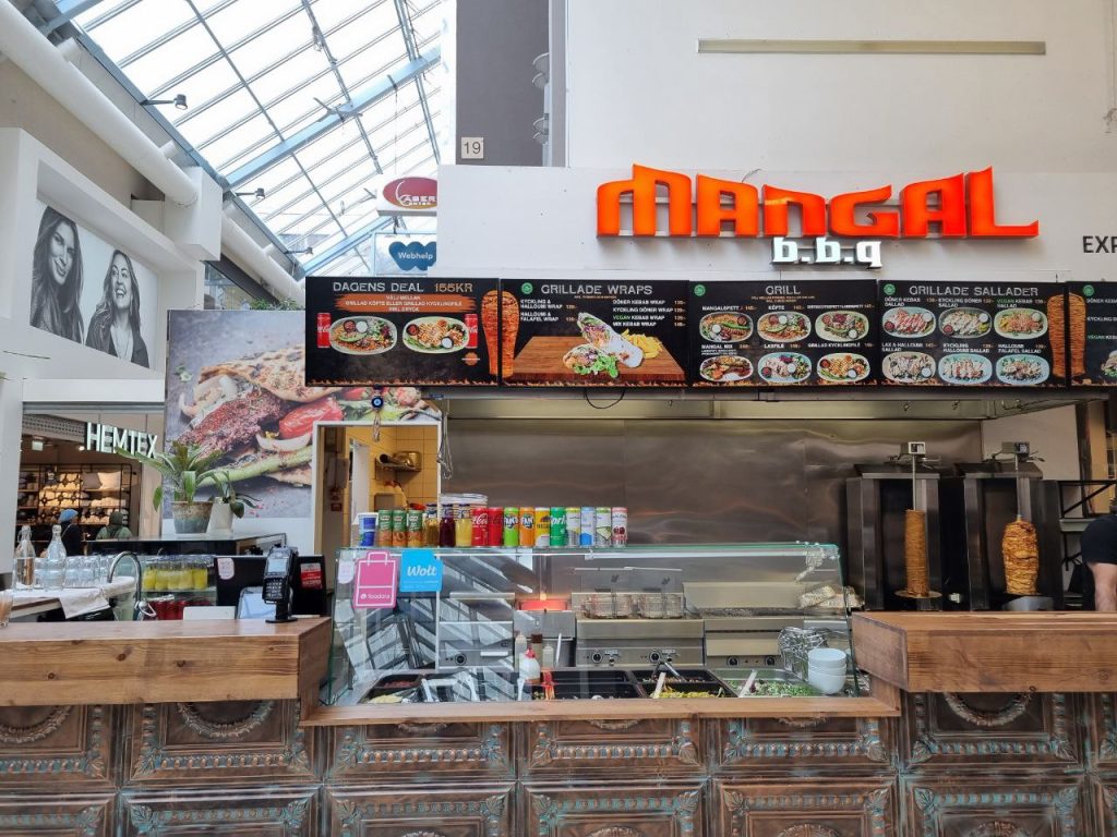 Food court in Solna Centrum with halal food options.