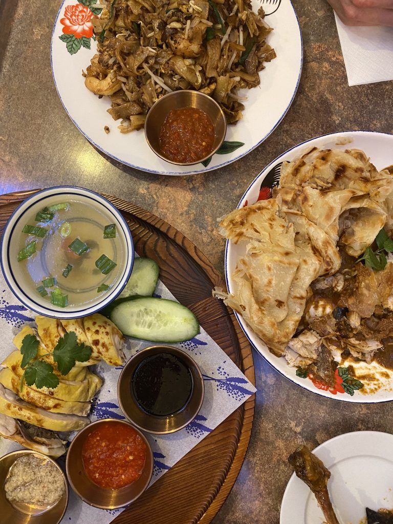 A photo of three plates of food 