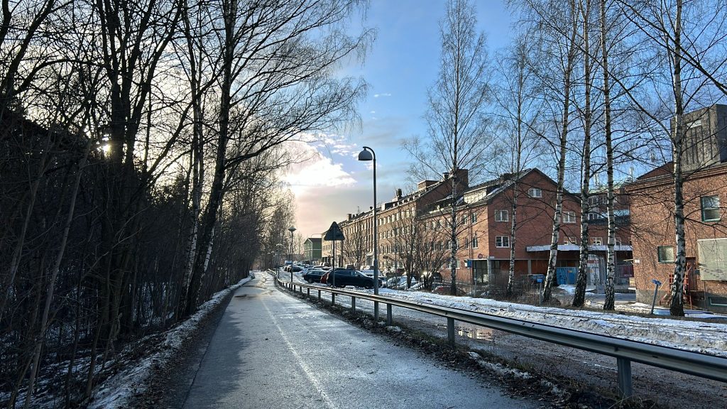 Sunny, snow lined street in stockholm.