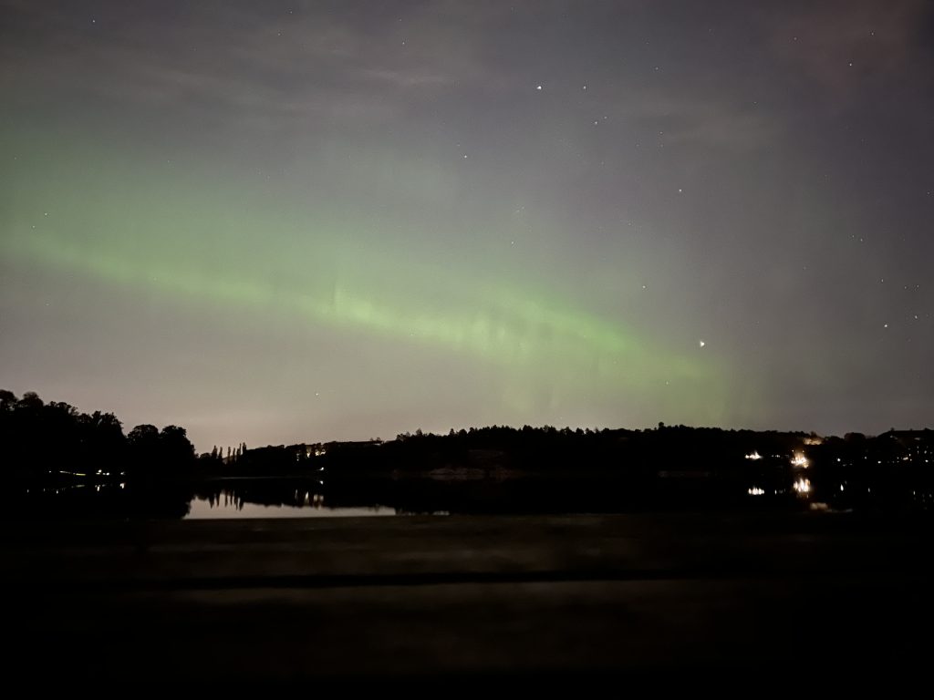 Picture of northern lights seen from a park in Stockholm