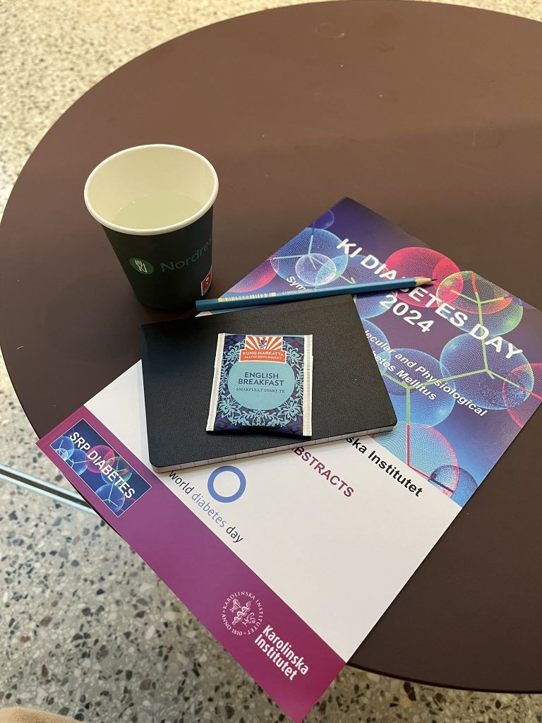 A pamphlet. notebook, cup and pencil for KI Diabetes Day.