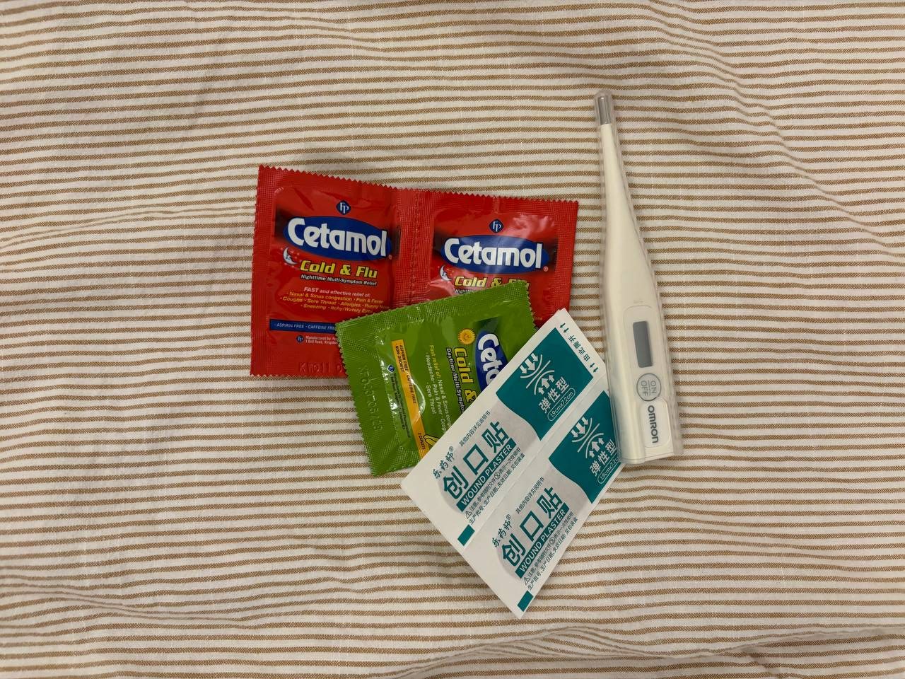 Flu medicine, bandaids and thermometers.
