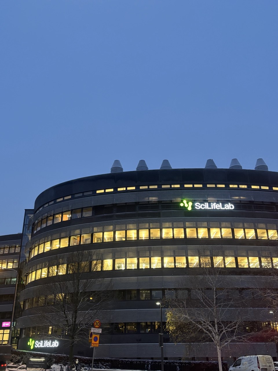 SciLifeLab building with the dark skies before the sunrise.
