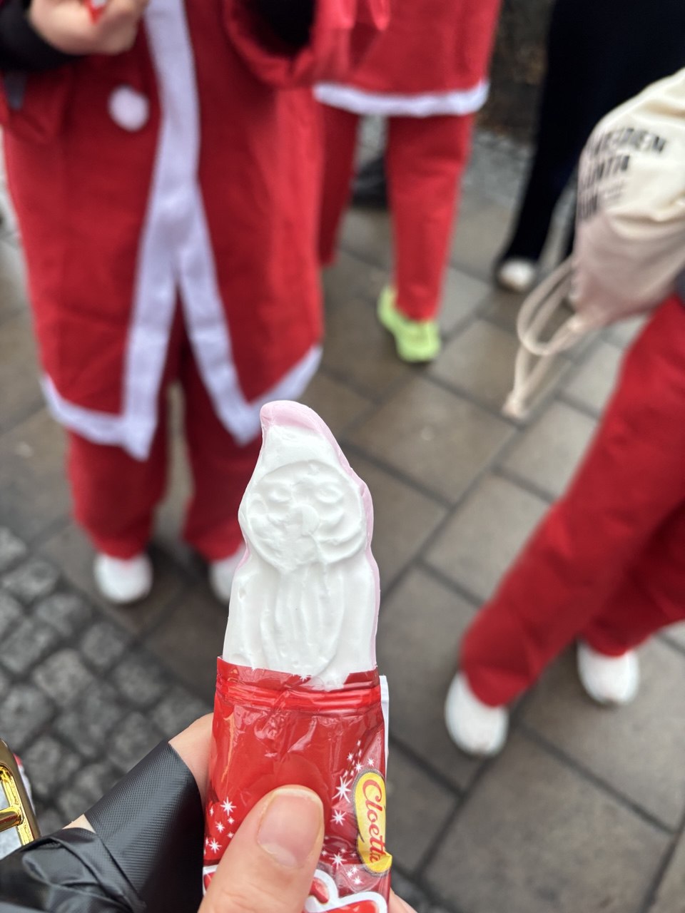 A christmas candy shaped held in my hand