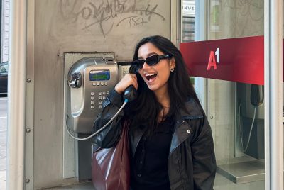 Saifa with a telephone. Photo credit: Saifa Ahmed