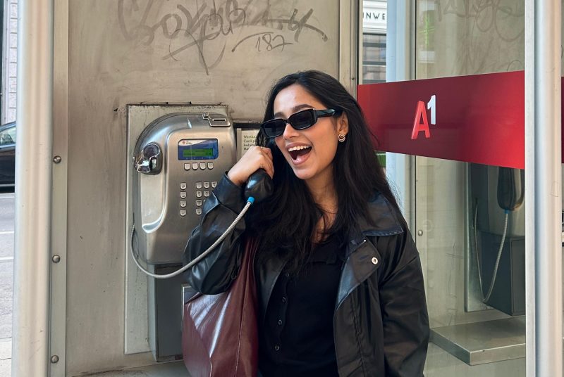 Saifa with a telephone. Photo credit: Saifa Ahmed