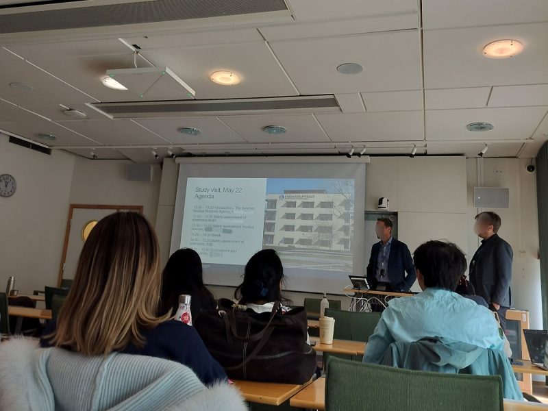 students looking at a presentation slide